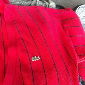 A 100% solid wool Lacoste cardigan